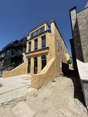 Residential exterior project at sheathing stage