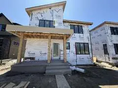 Residential exterior wrapped and ready for installation